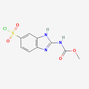molecular formula C9H8ClN3O4S B3024597 Methyl [6-(chlorosulfonyl)-1H-benzimidazol-2-yl]carbamate CAS No. 79213-74-4