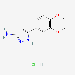molecular formula C11H12ClN3O2 B3025430 3-(2,3-Dihydrobenzo[b][1,4]dioxin-6-yl)-1H-pyrazol-5-amine hydrochloride CAS No. 1031793-23-3