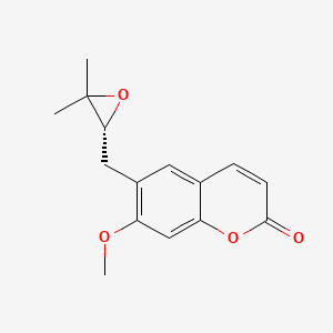 molecular formula C15H16O4 B3025984 6-[[(2R)-3,3-Dimethyloxiran-2-yl]methyl]-7-methoxychromen-2-one CAS No. 80368-68-9