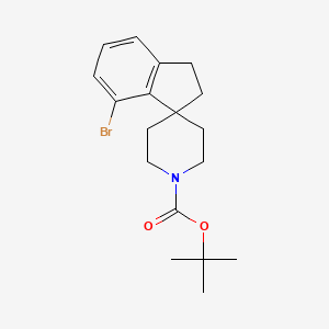 molecular formula C18H24BrNO2 B3026861 叔丁基 7-溴-2,3-二氢螺[茚满-1,4'-哌啶]-1'-羧酸酯 CAS No. 1160247-38-0
