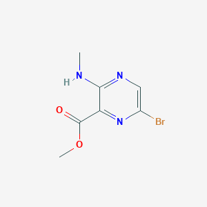 molecular formula C7H8BrN3O2 B3027586 Methyl 6-bromo-3-(methylamino)pyrazine-2-carboxylate CAS No. 13457-23-3
