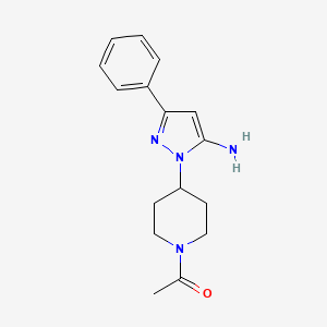 B3027719 1-[4-(5-Amino-3-phenyl-1H-pyrazol-1-yl)piperidin-1-yl]ethan-1-one CAS No. 1365968-54-2