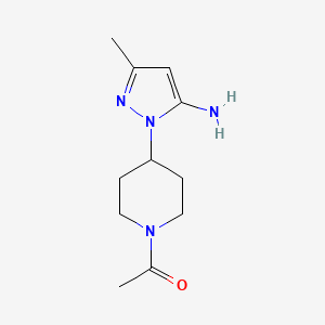 molecular formula C11H18N4O B3027727 1-[4-(5-Amino-3-methyl-1H-pyrazol-1-yl)piperidin-1-yl]ethan-1-one CAS No. 1365988-13-1