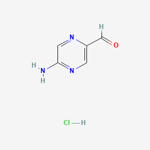molecular formula C5H6ClN3O B3028376 5-Aminopyrazine-2-carbaldehyde hydrochloride CAS No. 1965308-99-9