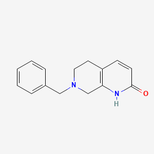 molecular formula C15H16N2O B3030131 7-Benzyl-5,6,7,8-tetrahydro-1,7-naphthyridin-2(1H)-one CAS No. 869640-41-5