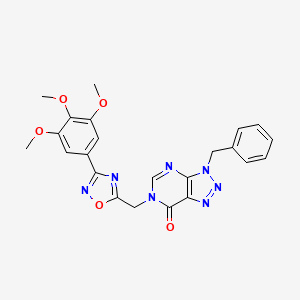 molecular formula C23H21N7O5 B3033529 3-benzyl-6-{[3-(3,4,5-trimethoxyphenyl)-1,2,4-oxadiazol-5-yl]methyl}-3,6-dihydro-7H-[1,2,3]triazolo[4,5-d]pyrimidin-7-one CAS No. 1040655-10-4