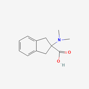2-(dimethylamino)-2,3-dihydro-1H-indene-2-carboxylic acid