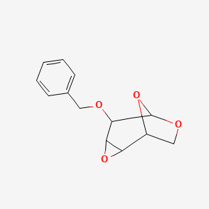 molecular formula C13H14O4 B3040526 5-苯甲氧基-3,7,9-三氧杂三环[4.2.1.02,4]壬烷 CAS No. 213594-43-5