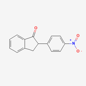 2-(4-Nitrophenyl)-2,3-dihydro-1H-inden-1-one