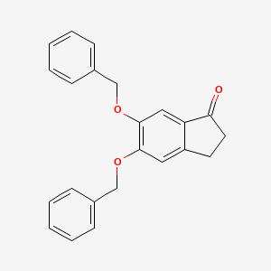 molecular formula C23H20O3 B3044789 1H-Inden-1-one, 2,3-dihydro-5,6-bis(phenylmethoxy)- CAS No. 100446-13-7