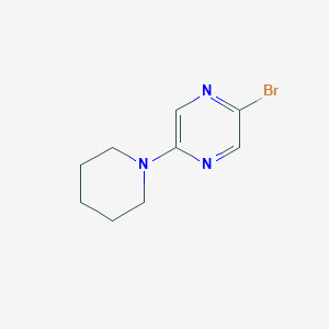 molecular formula C9H12BrN3 B3045396 2-Bromo-5-(piperidin-1-yl)pyrazine CAS No. 1060803-86-2