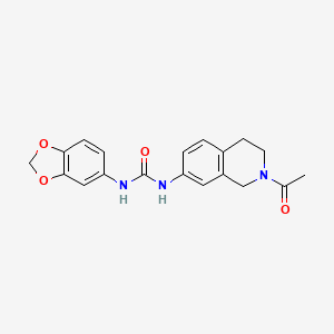 molecular formula C19H19N3O4 B3046187 1-(2-Acetyl-1,2,3,4-tetrahydroisoquinolin-7-yl)-3-(benzo[d][1,3]dioxol-5-yl)urea CAS No. 1207022-16-9