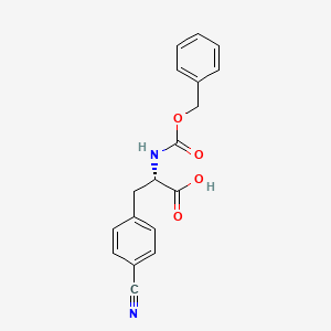 molecular formula C18H16N2O4 B3046881 (S)-2-(((Benzyloxy)carbonyl)amino)-3-(4-cyanophenyl)propanoic acid CAS No. 131669-07-3
