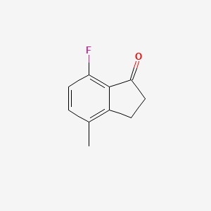 molecular formula C10H9FO B3047317 7-氟-4-甲基-2,3-二氢-1H-茚-1-酮 CAS No. 137466-14-9