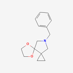 molecular formula C15H19NO2 B3047880 10-(Phenylmethyl)-5,8-dioxa-10-azadispiro[2.0.4.3]undecane CAS No. 147011-43-6