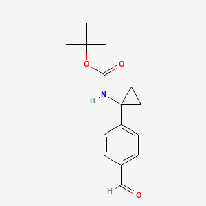 tert-Butyl N-[1-(4-formylphenyl)cyclopropyl]carbamate