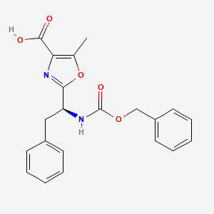 molecular formula C21H20N2O5 B3049487 2-[(1S)-1-{[(benzyloxy)carbonyl]amino}-2-phenylethyl]-5-methyl-1,3-oxazole-4-carboxylic acid CAS No. 208665-44-5