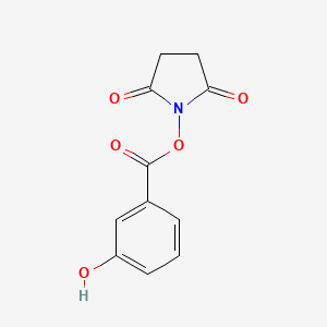 molecular formula C11H9NO5 B3056284 3-Hydroxy-benzoic acid 2,5-dioxo-pyrrolidin-1-yl ester CAS No. 70120-41-1