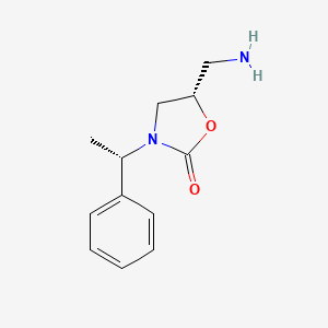 (5S)-5-(Aminomethyl)-3-[(1S)-1-phenylethyl]-1,3-oxazolidin-2-one