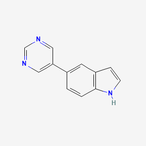 molecular formula C12H9N3 B3059450 5-(Pyrimidin-5-YL)-1H-indole CAS No. 144104-51-8