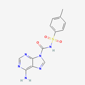 molecular formula C13H12N6O3S B3065385 6-Amino-N-[(4-methylphenyl)sulfonyl]-9H-purine-9-carboxamide CAS No. 401937-84-6