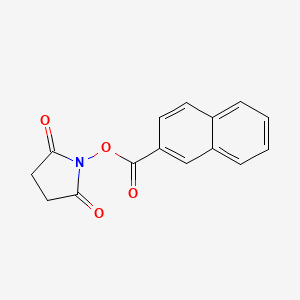 molecular formula C15H11NO4 B3065674 2,5-吡咯烷二酮，1-[(2-萘甲酰氧基)]- CAS No. 56374-47-1