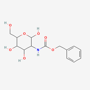 benzyl N-[2,4,5-trihydroxy-6-(hydroxymethyl)oxan-3-yl]carbamate