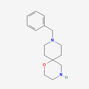 molecular formula C15H22N2O B3074002 9-Benzyl-1-oxa-4,9-diazaspiro[5.5]undecane CAS No. 1018608-18-8