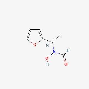 molecular formula C7H9NO3 B3075773 N-[1-(furan-2-yl)ethyl]-N-hydroxyformamide CAS No. 1035818-90-6