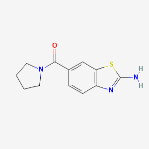 molecular formula C12H13N3OS B3079558 (2-Aminobenzo[d]thiazol-6-yl)(pyrrolidin-1-yl)methanone CAS No. 1071360-23-0