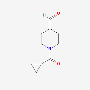 molecular formula C10H15NO2 B3080197 1-Cyclopropanecarbonylpiperidine-4-carbaldehyde CAS No. 1082446-73-8