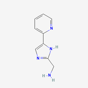 molecular formula C9H10N4 B3085523 (5-(吡啶-2-基)-1H-咪唑-2-基)甲胺 CAS No. 1156708-95-0