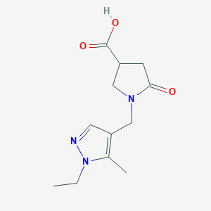 molecular formula C12H17N3O3 B3087295 1-[(1-ethyl-5-methyl-1H-pyrazol-4-yl)methyl]-5-oxopyrrolidine-3-carboxylic acid CAS No. 1172394-80-7