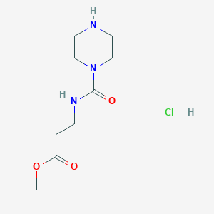 molecular formula C9H18ClN3O3 B3087863 3-[(Piperazine-1-carbonyl)-amino]-propionic acid methyl ester hydrochloride CAS No. 1177651-87-4