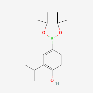 molecular formula C15H23BO3 B3089024 2-Isopropyl-4-(4,4,5,5-tetramethyl-1,3,2-dioxaborolan-2-YL)phenol CAS No. 1188335-75-2