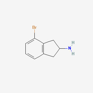 molecular formula C9H10BrN B3089630 4-Bromo-2,3-dihydro-1H-inden-2-amine CAS No. 1196157-02-4