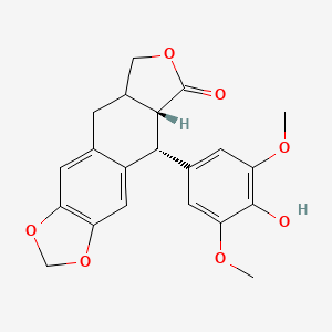 molecular formula C21H20O7 B3090636 (5R,5Ar)-5-(4-hydroxy-3,5-dimethoxyphenyl)-5a,8,8a,9-tetrahydro-5H-[2]benzofuro[5,6-f][1,3]benzodioxol-6-one CAS No. 1212463-68-7