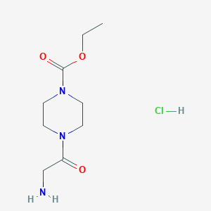 molecular formula C9H18ClN3O3 B3091145 Ethyl 4-(2-aminoacetyl)piperazine-1-carboxylate hydrochloride CAS No. 1216740-02-1