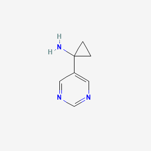 molecular formula C7H9N3 B3091191 1-(Pyrimidin-5-yl)cyclopropan-1-amine CAS No. 1217340-83-4