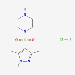 molecular formula C9H17ClN4O2S B3092970 1-((3,5-二甲基-1H-吡唑-4-基)磺酰基)哌嗪盐酸盐 CAS No. 1240238-30-5