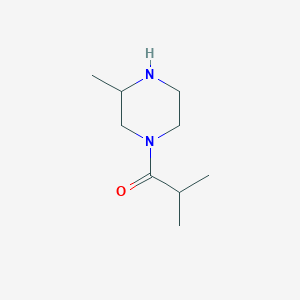 molecular formula C9H18N2O B3093166 2-Methyl-1-(3-methylpiperazin-1-yl)propan-1-one CAS No. 1240573-07-2