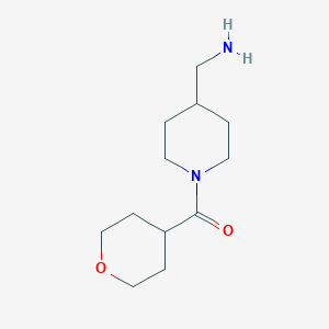 [1-(Oxane-4-carbonyl)piperidin-4-yl]methanamine