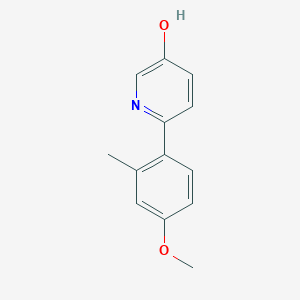 molecular formula C13H13NO2 B3095183 6-(4-Methoxy-2-methylphenyl)pyridin-3-ol CAS No. 1261937-56-7