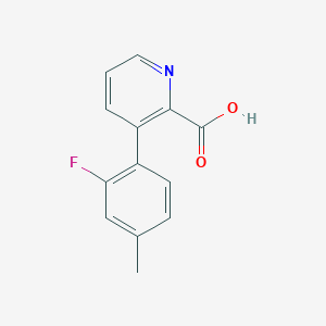 molecular formula C13H10FNO2 B3095206 3-(2-Fluoro-4-methylphenyl)picolinic acid CAS No. 1261962-42-8