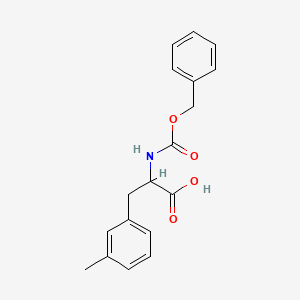 molecular formula C18H19NO4 B3097571 2-{[(Benzyloxy)carbonyl]amino}-3-(3-methylphenyl)propanoic acid CAS No. 1313033-09-8