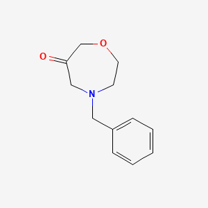 molecular formula C12H15NO2 B3098692 4-苄基-[1,4]恶杂环己酮 CAS No. 1341038-00-3