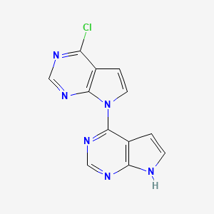 molecular formula C12H7ClN6 B3099049 4-chloro-7-{7H-pyrrolo[2,3-d]pyrimidin-4-yl}-7H-pyrrolo[2,3-d]pyrimidine CAS No. 134965-85-8