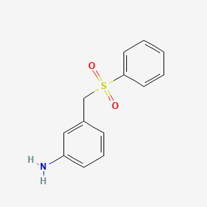 molecular formula C13H13NO2S B3099246 3-[(苯磺酰)甲基]苯胺 CAS No. 135294-61-0