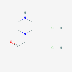 molecular formula C7H16Cl2N2O B3099267 1-Piperazin-1-ylacetone dihydrochloride CAS No. 1353504-07-0