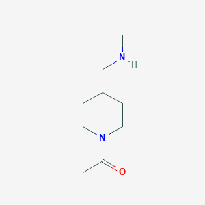 molecular formula C9H18N2O B3099315 1-(4-Methylaminomethyl-piperidin-1-yl)-ethanone CAS No. 1353944-09-8
